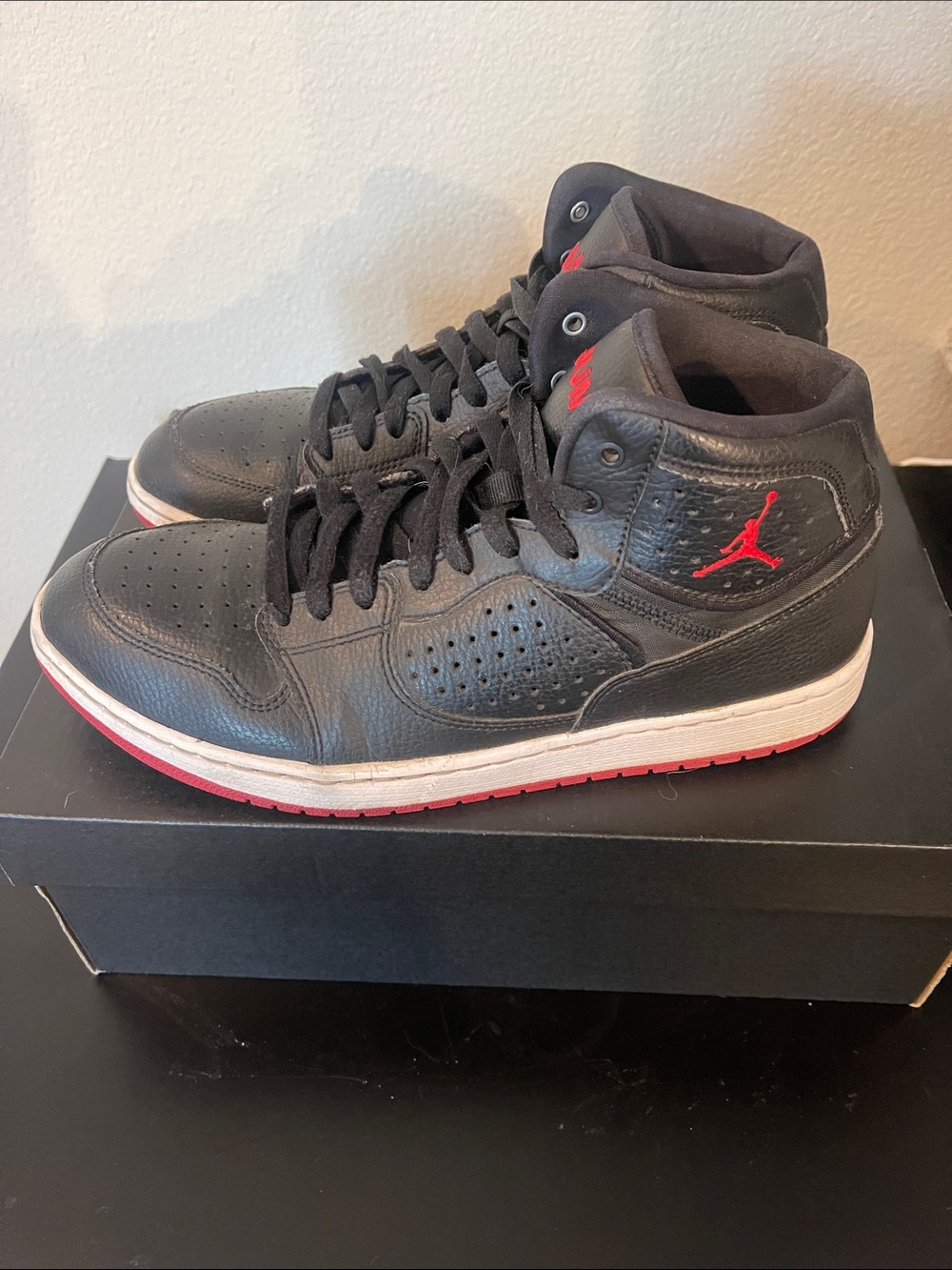 Jordan Black and Red Mid-Top Sneakers